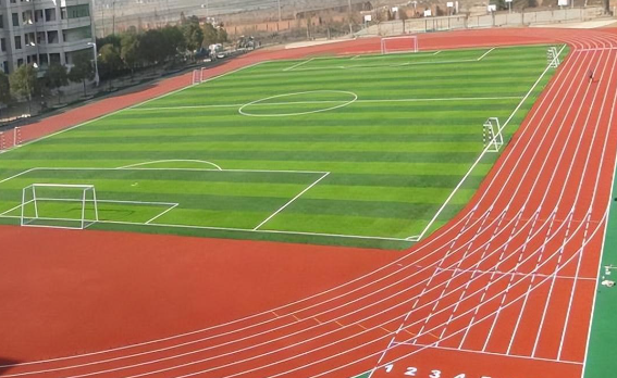 How long is a track around a football field